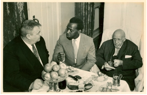 W. E. B. Du Bois and others gathered around table in Soviet Union, 1958. Courtesy of W. E. B. Du Bois Papers (MS 312). Special Collections and University Archives, University of Massachusetts Amherst Libraries